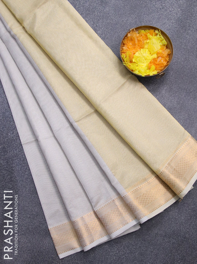 Maheshwari silk cotton saree pastel grey with allover zari woven small checked pattern and zari woven border