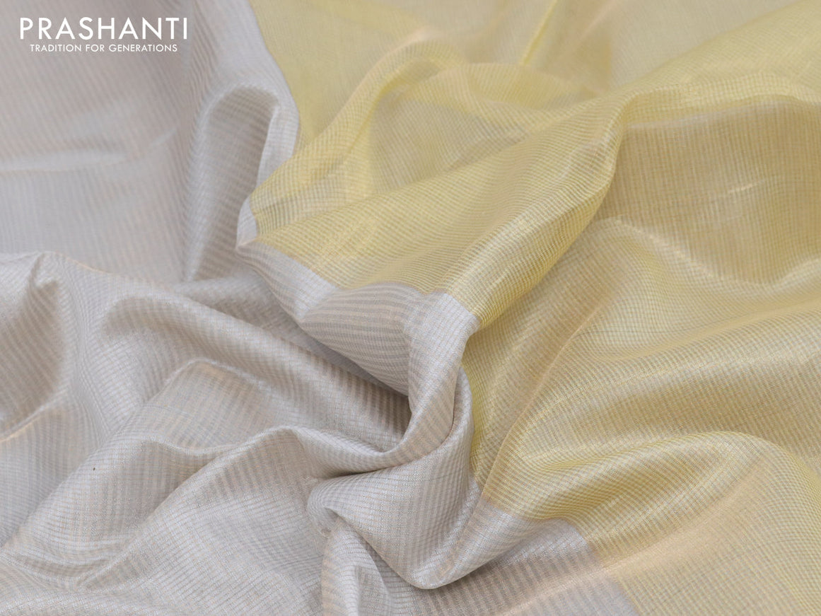 Maheshwari silk cotton saree pastel grey with allover zari woven small checked pattern and zari woven border