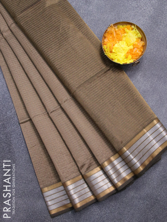 Maheshwari silk cotton saree chikku shade with allover zari woven checked pattern and zari woven border