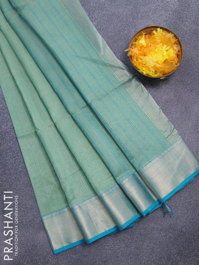 Maheshwari silk cotton saree pastel green with allover zari checked pattern and zari woven border