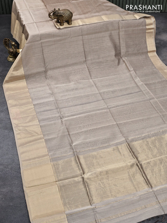 Maheshwari silk cotton saree grey shade with allover stripes pattern and zari woven border