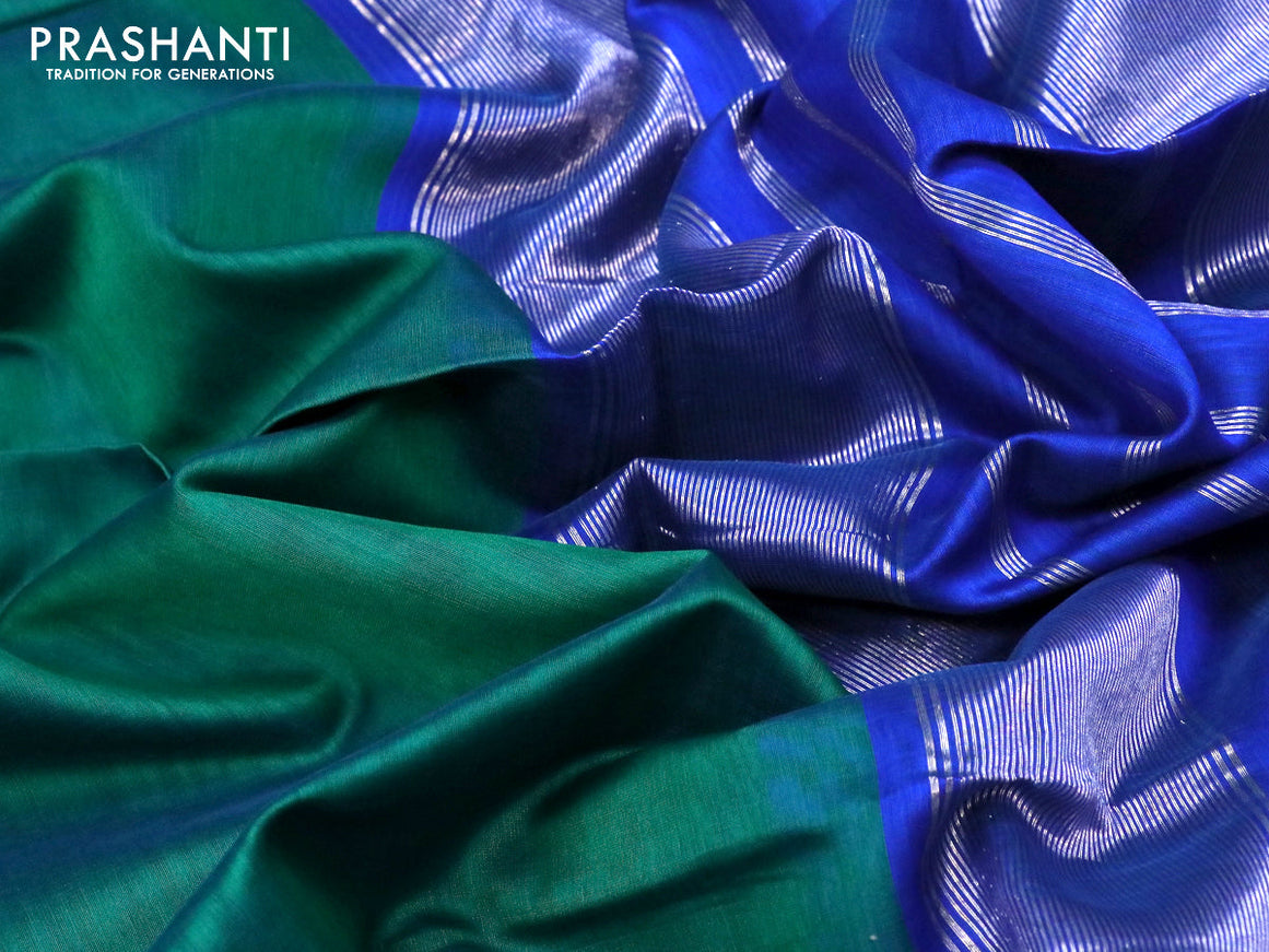 Maheshwari silk cotton saree green and cs blue with plain body and silver zari woven border