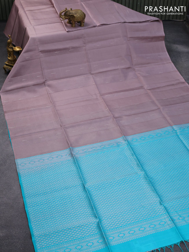 Pure soft silk saree grey shade and teal blue with allover zari weaves in borderless style