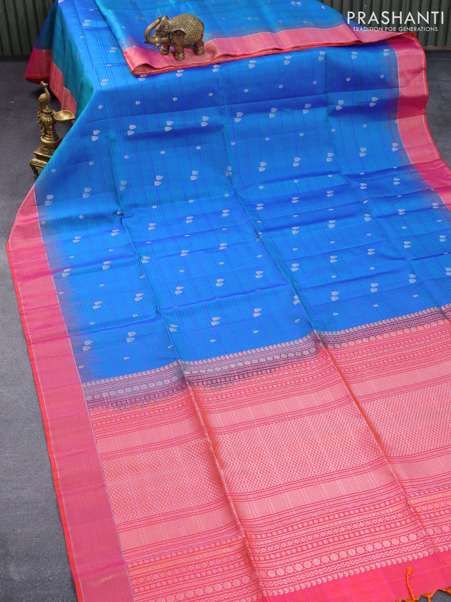 Pure soft silk saree dual shade of blue and dual shade of pinkish orange with allover stripes & silver zari buttas and zari woven border