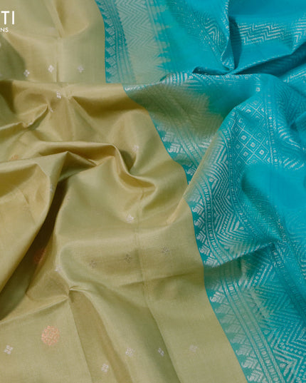 Pure soft silk saree elaichi green shade and teal blue with allover silver & copper zari buttas and simple border