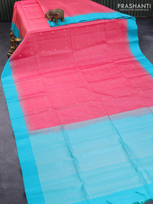 Pure soft silk saree peach pink and teal blue with allover silver & copper zari buttas and simple border