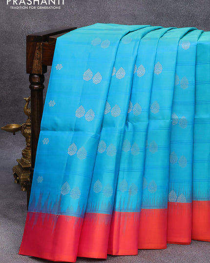 Pure soft silk saree teal blue and dual shade of pinkish orange with silver zari woven butta weaves and simple border