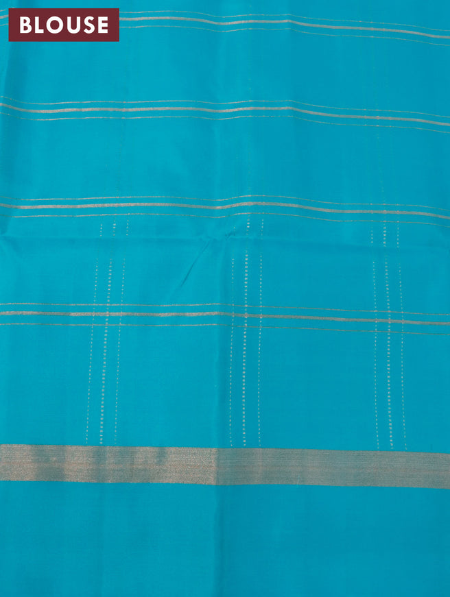 Pure soft silk saree grey shade and teal blue with allover checks & copper zari woven buttas and simple border