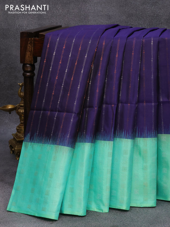 Pure soft silk saree navy blue and teal green with allover silver & copper zari weaves and long silver & copper zari woven buttas border