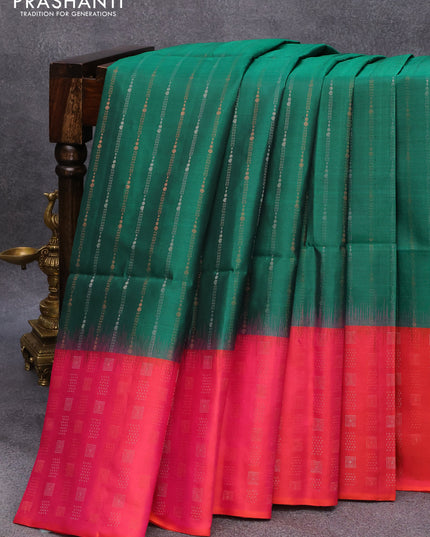 Pure soft silk saree dark green and dual shade of pinkish orange with allover silver & copper zari weaves and long silver & copper zari woven butta border