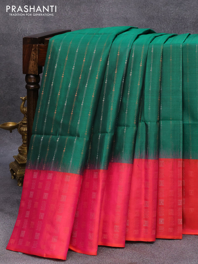 Pure soft silk saree dark green and dual shade of pinkish orange with allover silver & copper zari weaves and long silver & copper zari woven butta border