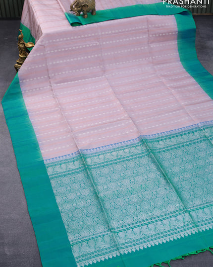 Pure soft silk saree pastel shade of pink and dual shade of bluish green with allover silver & copper zari weaves ans simple border