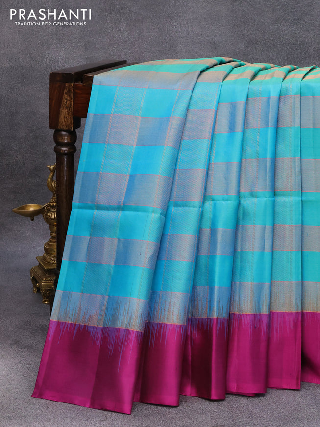 Pure soft silk saree dual shade of teal blue and purple with allover zari checked pattern and simple border