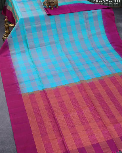 Pure soft silk saree dual shade of teal blue and purple with allover zari checked pattern and simple border