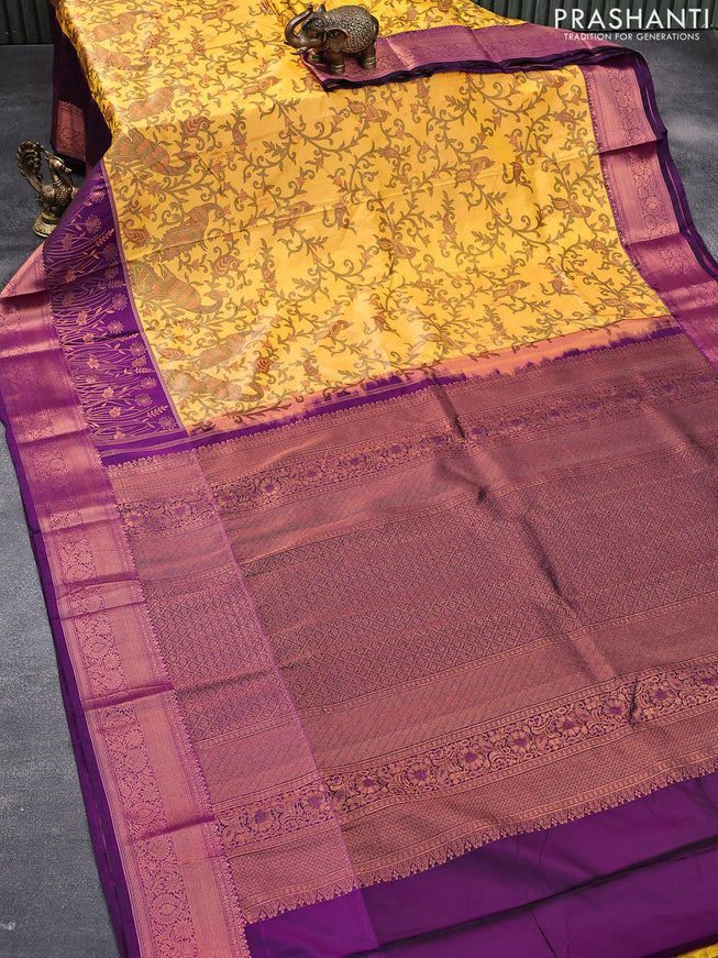 Bangalori silk saree mango yellow and purple with allover kalamkari prints & copper zari woven buttas and copper long zari woven border