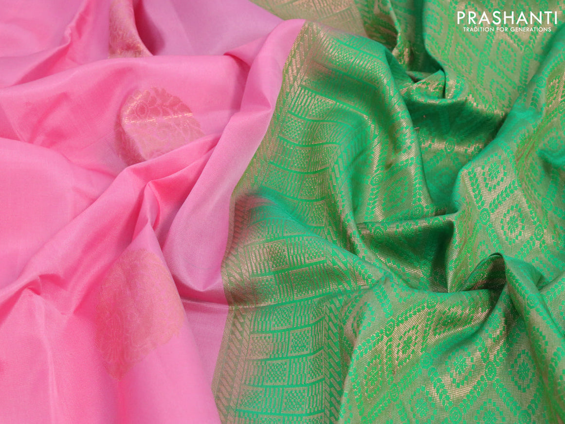 Roopam silk saree pink and green with copper zari woven buttas in borderless style