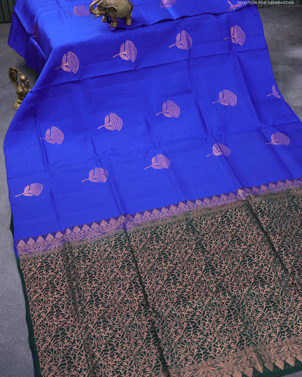 Roopam silk saree royal blue and bottle green with copper zari woven floral buttas in borderless style