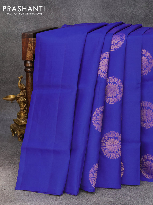 Roopam silk saree royal blue and mustard yellow with copper zari woven floral buttas in borderless style