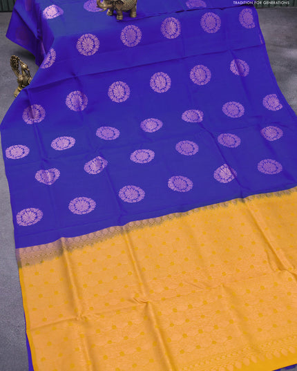Roopam silk saree royal blue and mustard yellow with copper zari woven floral buttas in borderless style