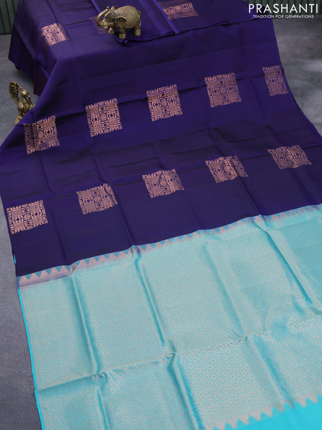 Roopam silk saree navy blue and teal blue with copper zari woven box type buttas in borderless style
