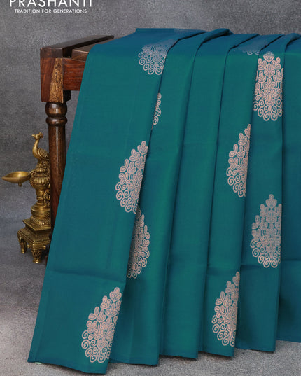Roopam silk saree peacock green and peach orange with copper zari woven buttas in borderless style
