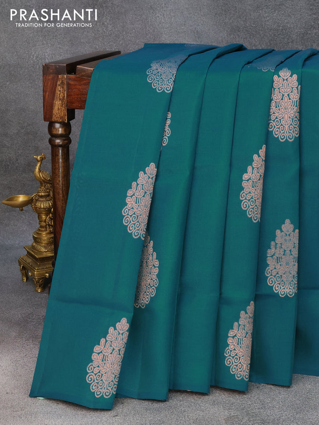 Roopam silk saree peacock green and peach orange with copper zari woven buttas in borderless style