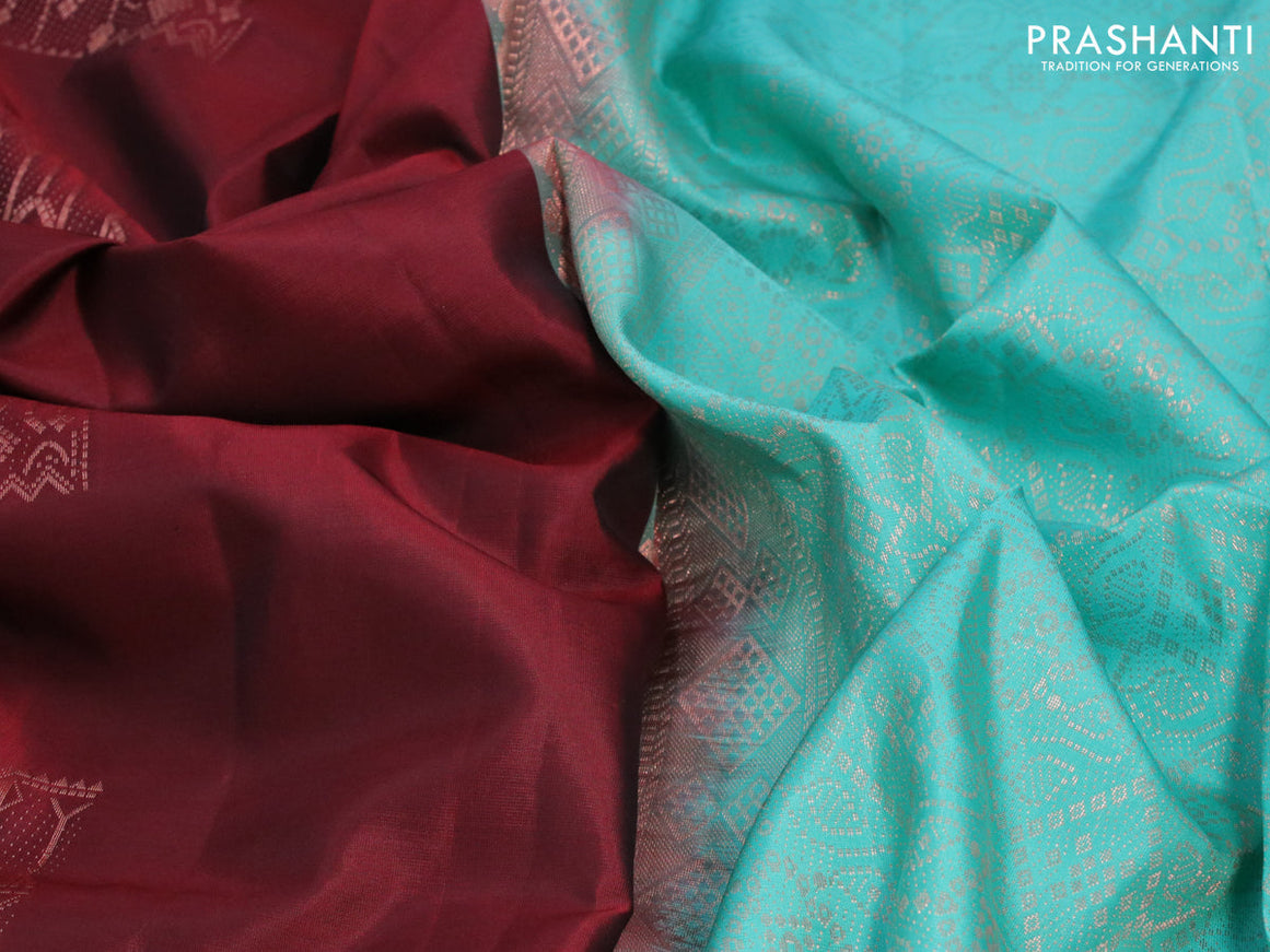 Roopam silk saree deep maroon and teal gereen with copper zari woven geometric buttas and copper zari woven border