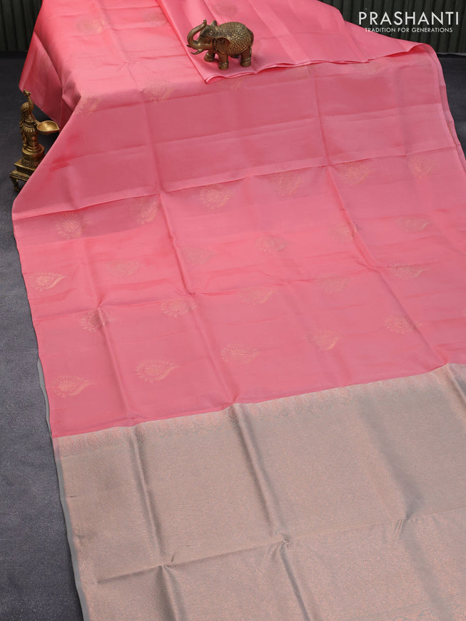 Roopam silk saree peach pink and grey shade with copper zari woven buttas in borderless style