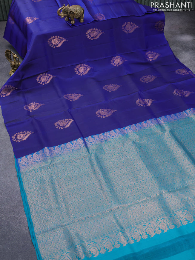 Roopam silk saree blue and peacock green with copper zari woven buttas in borderless style