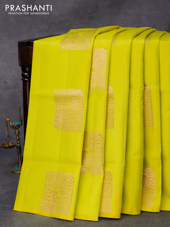 Roopam silk saree lime yellow and light pink with copper zari woven box type buttas in borderless style