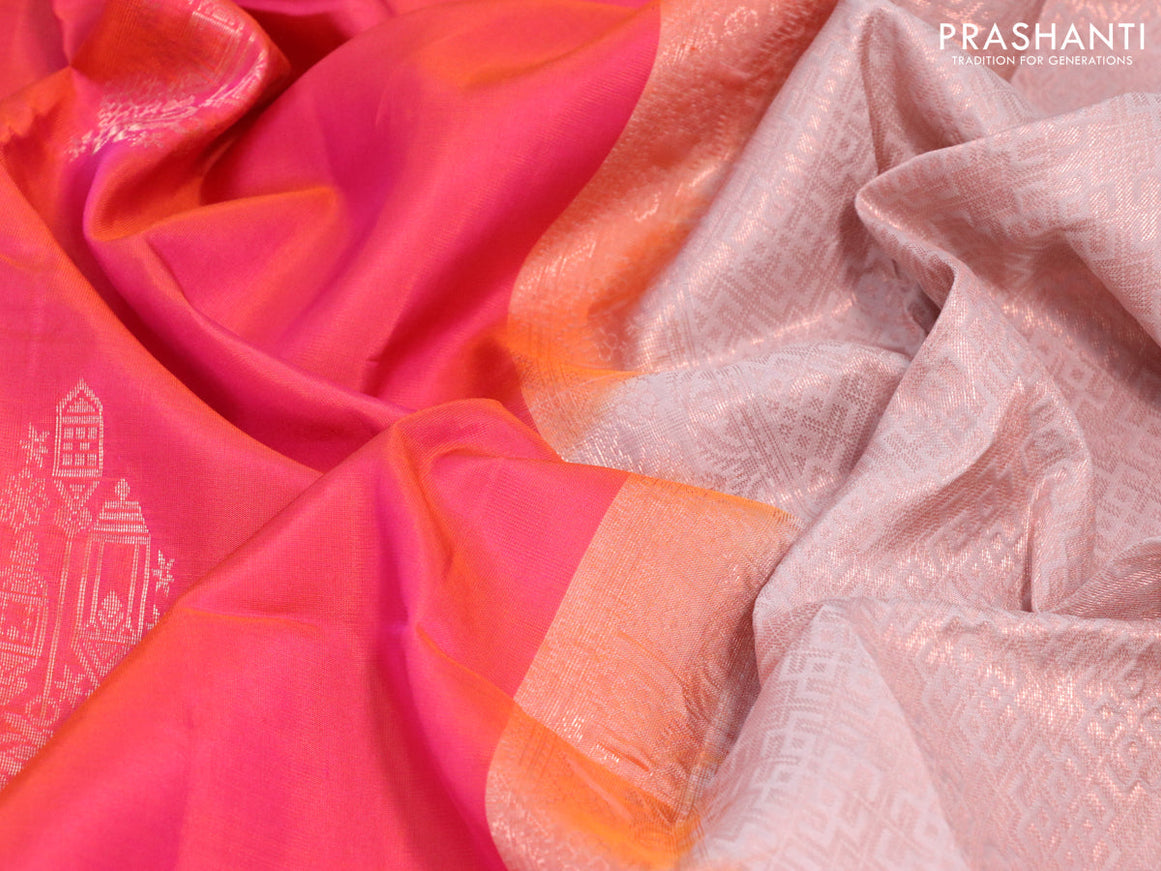 Roopam silk saree dual shade of pinkish orange and pastel pink shade with copper zari woven buttas in borderless style