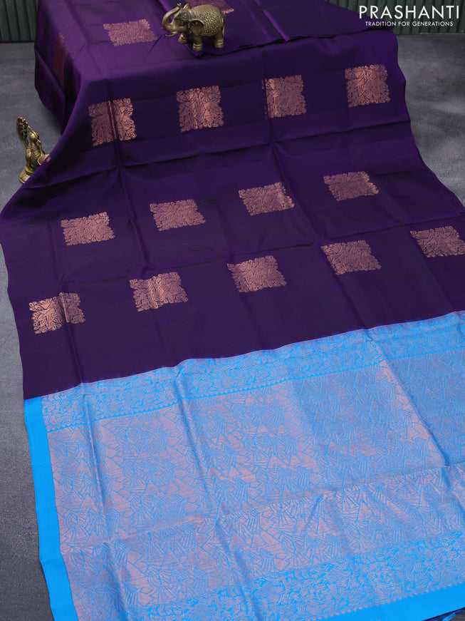 Roopam silk saree violet and cs blue with copper zari woven buttas in borderless style