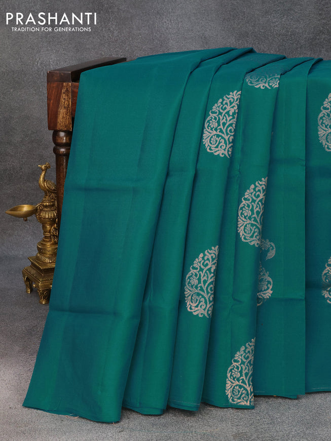 Roopam silk saree teal blue and mustard yellow with copper zari woven paisley buttas in borderless style