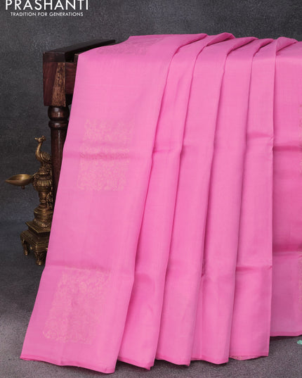 Roopam silk saree light pink and grey shade with copper zari woven buttas in borderless style