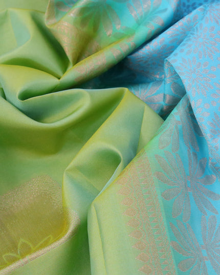 Roopam silk saree dual shade of green and blue with copper zari woven box type buttas and copper zari woven butta border