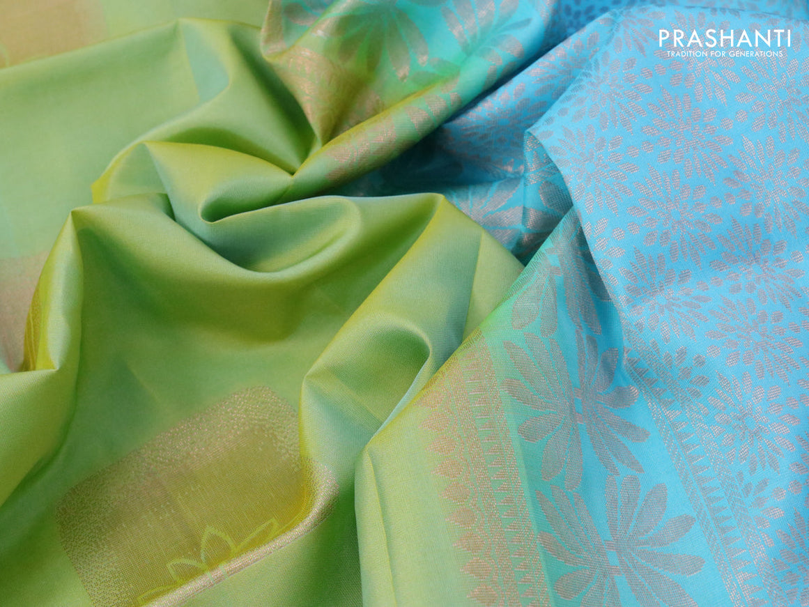 Roopam silk saree dual shade of green and blue with copper zari woven box type buttas and copper zari woven butta border