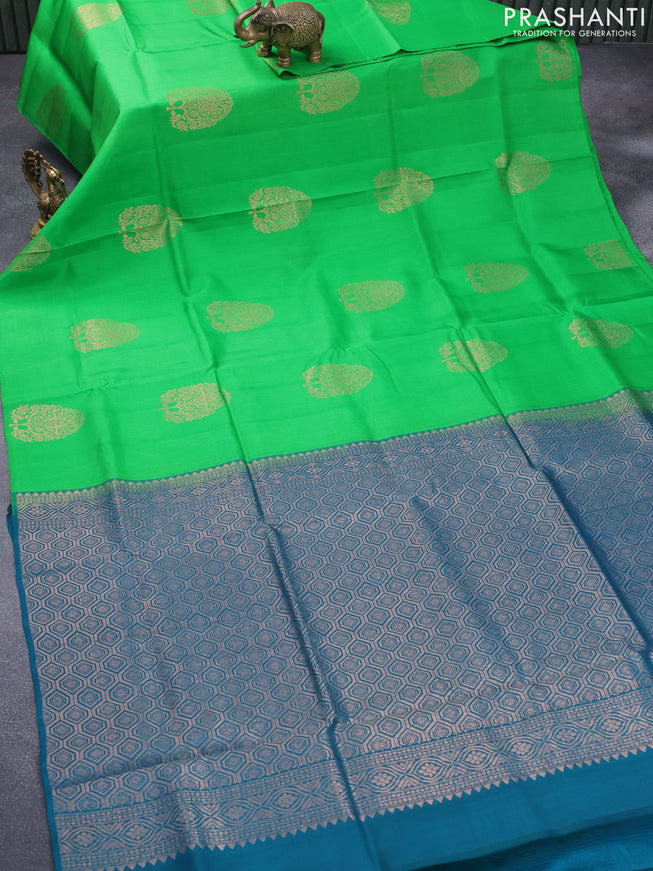 Roopam silk saree green and peacock green with copper zari woven buttas in borderless style