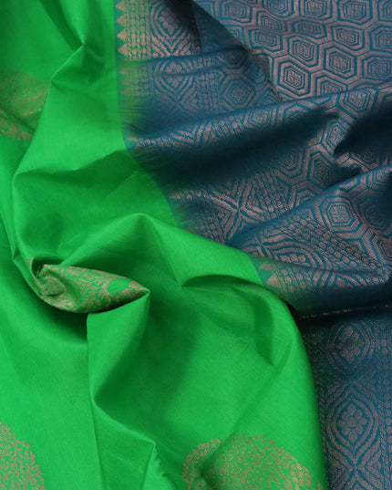 Roopam silk saree green and peacock green with copper zari woven buttas in borderless style