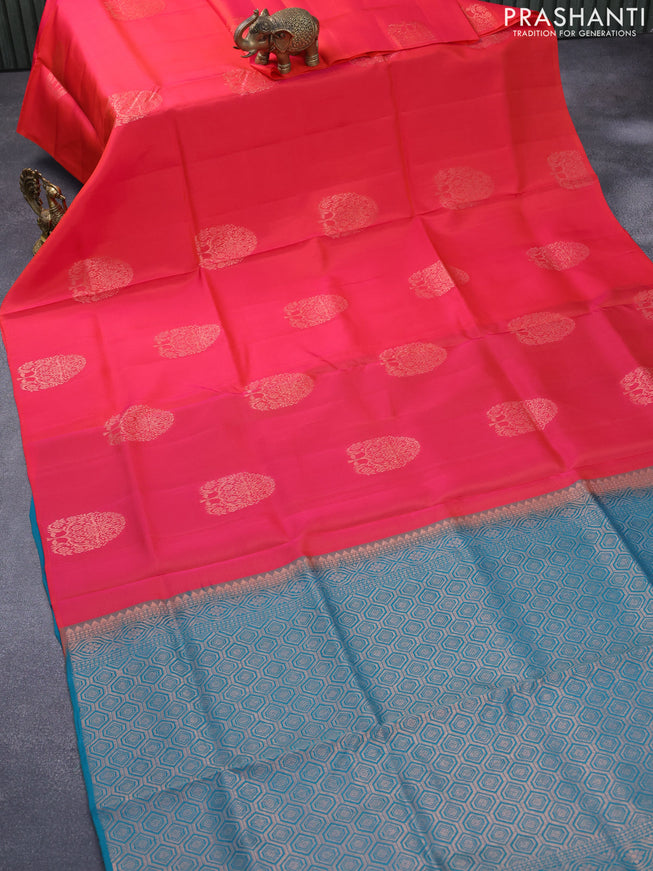 Roopam silk saree dual shade of reddish pink and peacock green with copper zari woven buttas in borderless style