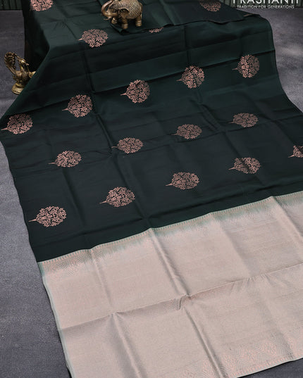 Roopam silk saree dark bottle green with copper zari woven buttas in borderless style