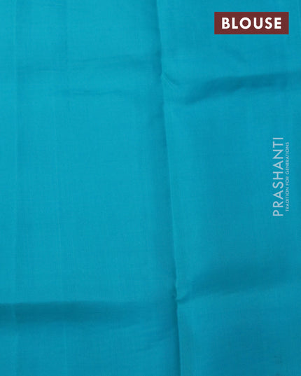 Roopam silk saree dual shade of pastel green and blue with copper zari woven buttas and copper zari woven butta border