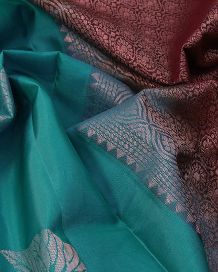 Roopam silk saree blue and deep maroon with copper zari woven leaf buttas in borderless style
