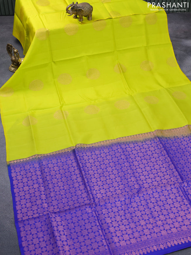 Roopam silk saree lime yellow and blue with copper zari woven buttas in borderless style