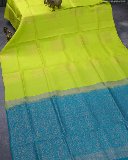 Roopam silk saree lime green and peacock green with copper zari woven buttas in borderless style