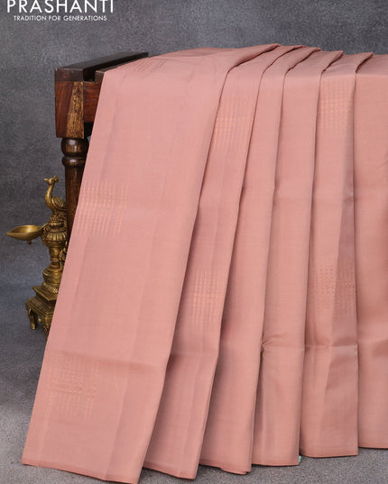 Roopam silk saree pastel brown and pink with copper zari woven geometric buttas in borderless style