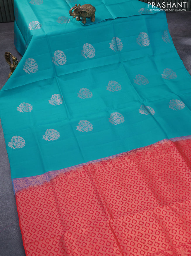 Roopam silk saree teal blue and dual shade of pink with copper zari woven floral buttas in borderless style