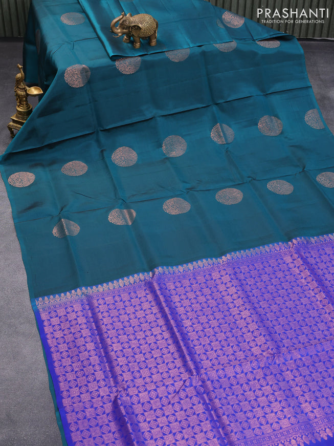 Roopam silk saree peacock green and blue with copper zari woven buttas in borderless style