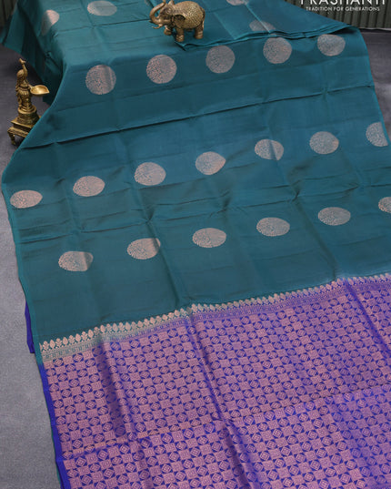 Roopam silk saree peacock green and blue with copper zari woven buttas in borderless style