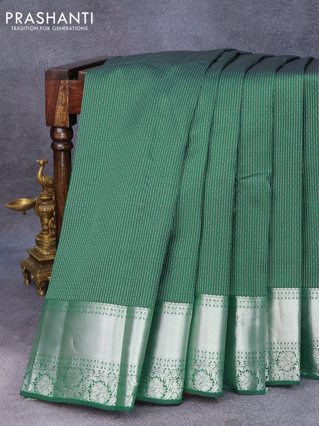 Roopam silk saree green with allover silver zari stripe weaves and silver zari woven floral border