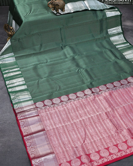 Roopam silk saree green with allover silver zari stripe weaves and silver zari woven floral border